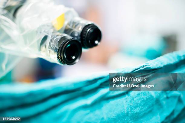 surgical microscope - microchirurgie stockfoto's en -beelden