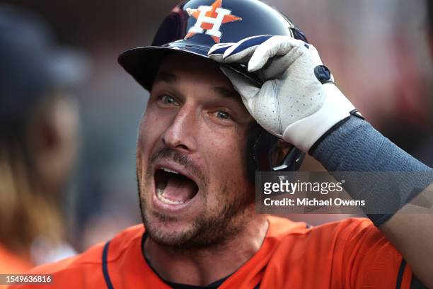 Alex Bregman of the Houston Astros reacts after hitting a two run home run to take the lead against the Los Angeles Angels during the ninth inning at...