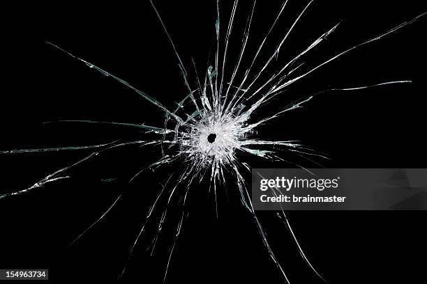 zerbrochenes glas - bullet holes stock-fotos und bilder