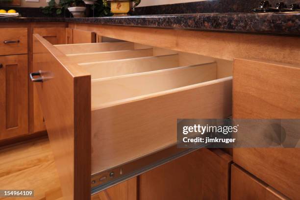 custom kitchen cabinetry and utensil drawer. - cupboard stock pictures, royalty-free photos & images