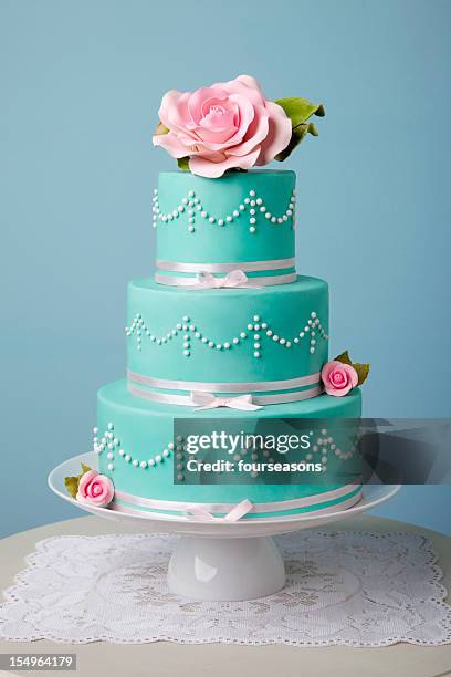 beautiful turquoise cake - wedding cakes stock pictures, royalty-free photos & images