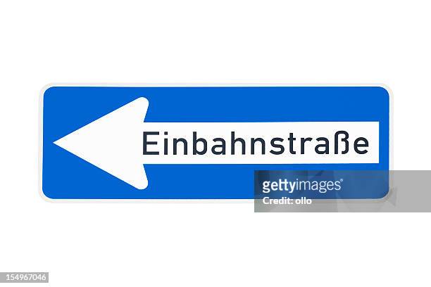 german one way traffic sign - einbahnstrasse - one direction stock pictures, royalty-free photos & images