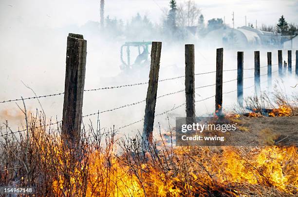 prairie grass fire and firefighter - prairie stock pictures, royalty-free photos & images