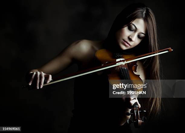 violinist - violin soloist stock pictures, royalty-free photos & images