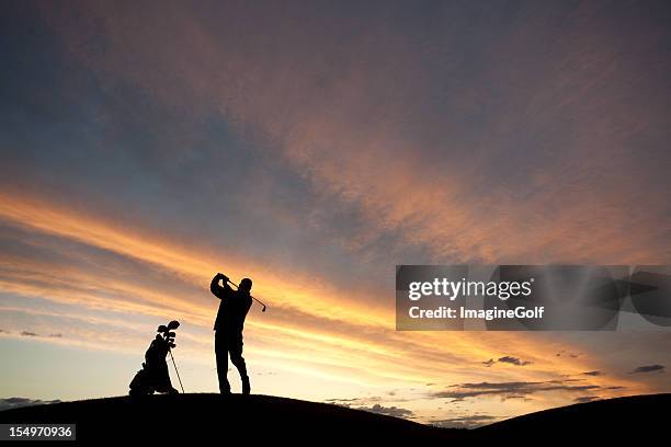 mature male golfer silhouette - golf swing sunset stock pictures, royalty-free photos & images