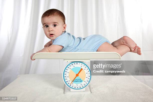 baby weight - mass unit of measurement stock pictures, royalty-free photos & images