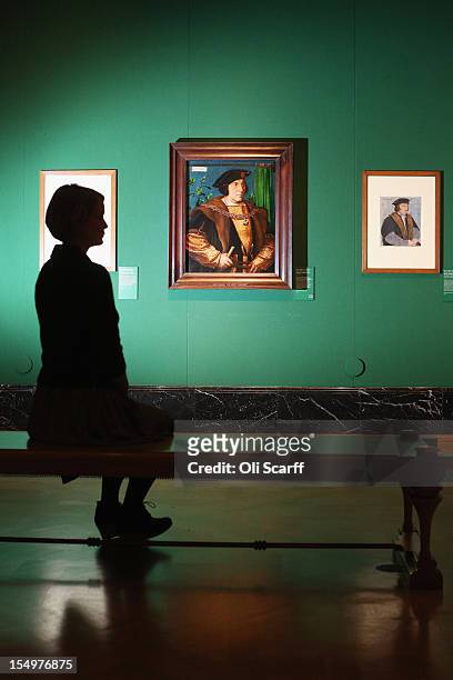 Woman admires a painting by Hans Holbein the Younger entitled 'Sir Henry Guildford' in the exhibition 'The Northern Renaissance: Durer to Holbein' at...