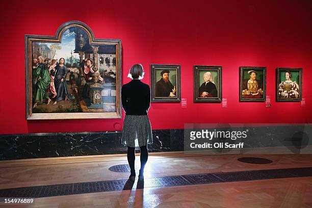 Woman admires paintings in the exhibition 'The Northern Renaissance: Durer to Holbein' at The Queen's Gallery on October 29, 2012 in London, England....