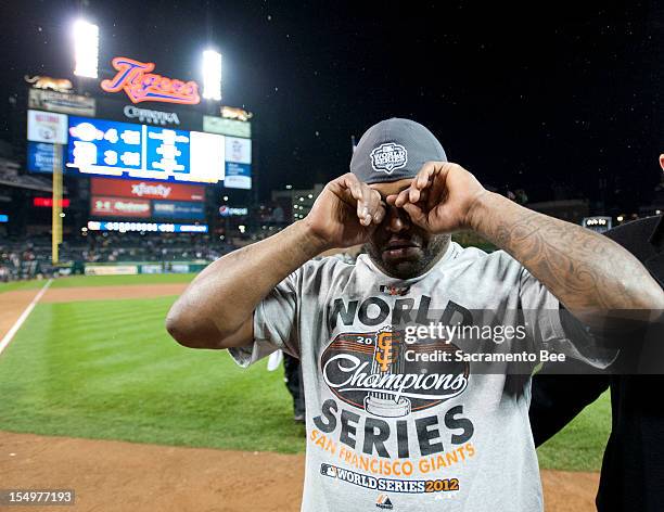 San Francisco Giants third baseman Pablo Sandoval , MVP of the World Series, wipes tears from his eyes after the San Francisco Giants beat the...