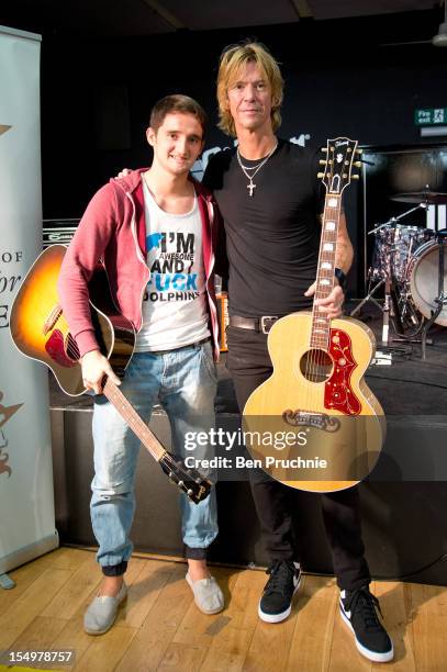 Duff McKagan poses with wounded soldier Danny O'Connor through the Help for Heroes charity on October 29, 2012 in London, England.