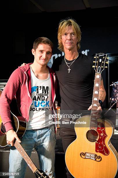 Duff McKagan poses with wounded soldier Danny O'Connor through the Help for Heroes charity on October 29, 2012 in London, England.