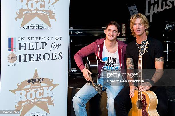 Duff McKagan poses with wounded soldier Danny O'Connor through the Help for Heroes charity on October 29, 2012 in London, England.