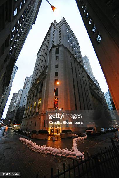 Sandbags surround the New York Stock Exchange in preparation for Hurricane Sandy in New York, U.S., on Monday, Oct. 29, 2012. Hurricane Sandy, the...