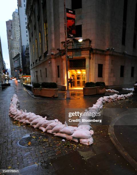 Sandbags surround the New York Stock Exchange in preparation for Hurricane Sandy in New York, U.S., on Monday, Oct. 29, 2012. Hurricane Sandy, the...