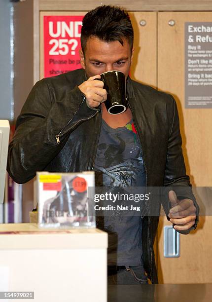 Peter Andre meets fans and signs copies of his album 'Angels & Demons' on October 29, 2012 in St Albans, England.
