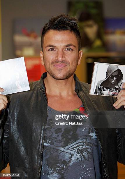 Peter Andre meets fans and signs copies of his album 'Angels & Demons' on October 29, 2012 in St Albans, England.