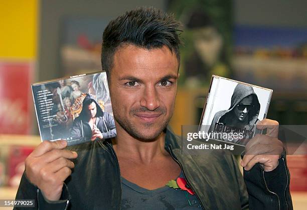 Peter Andre meets fans and signs copies of his album 'Angels & Demons' on October 29, 2012 in St Albans, England.