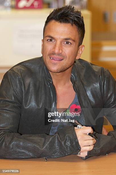 Peter Andre meets fans and signs copies of his album 'Angels & Demons' on October 29, 2012 in St Albans, England.