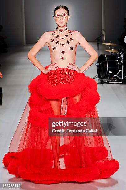 Model walks the runway during FH by Fause Haten - Sao Paulo Fashion Week on October 29, 2012 in Sao Paulo, Brazil.