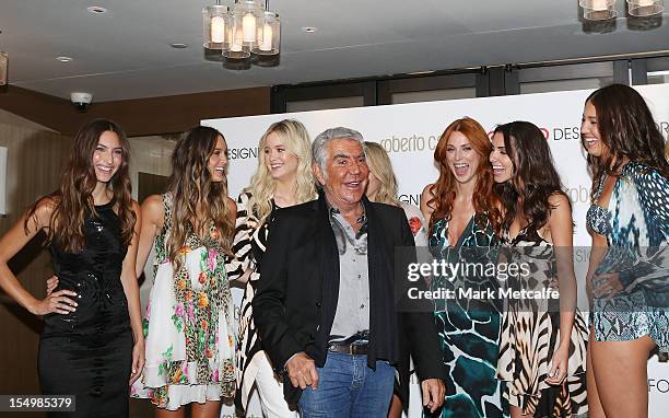 Roberto Cavalli poses with models at the Roberto Cavalli for Target launch at the Park Hyatt on October 30, 2012 in Sydney, Australia.