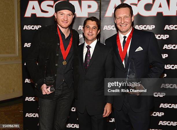 Eric Paslay, Michael Murphy and Terry Sawchuk pose with award at the 50th Annual ASCAP Country Music Awards at the Gaylord Opryland Hotel on October...