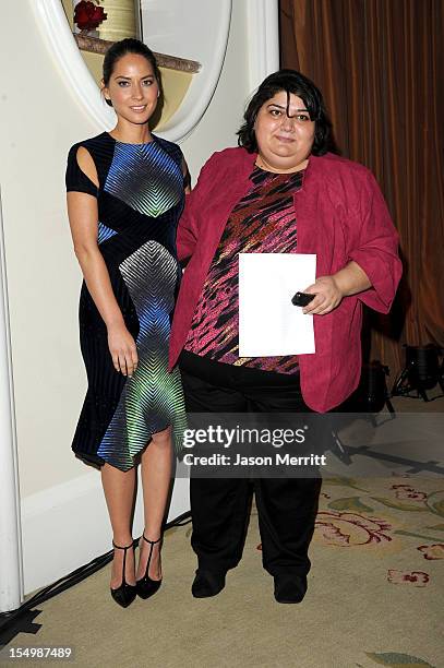Actress Olivia Munn and Honoree Khadija Ismayilova attend the 2012 Courage in Journalism Awards hosted by the International Women's Media Foundation...