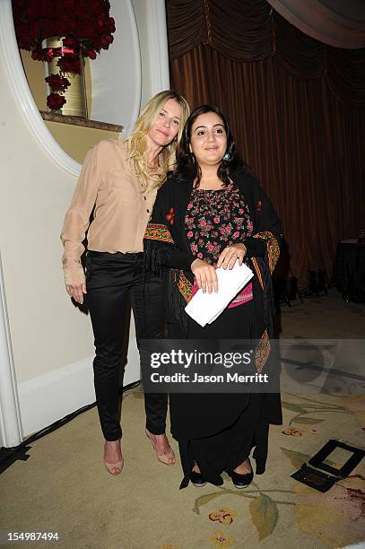 Personality Chelsea Handler and honoree Asmaa al-Ghoul attend the 2012 Courage in Journalism Awards hosted by the International Women's Media...