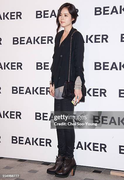 Han Ga-In poses for photographs upon arrival during the 'BEAKER' flagship Store launch party on October 25, 2012 in Seoul, South Korea.