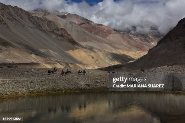 Group of people, including relatives of passengers of the Uruguayan Air Force plane that crashed in the remote Andes Mountains in the Argentine...