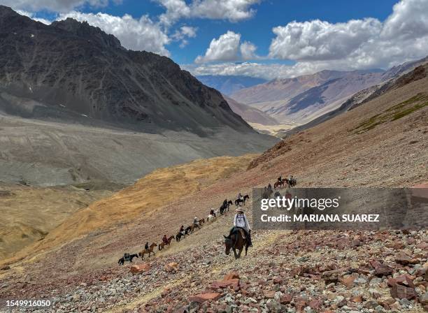 Group of people, including relatives of passengers of the Uruguayan Air Force plane that crashed in the remote Andes Mountains in the Argentine...