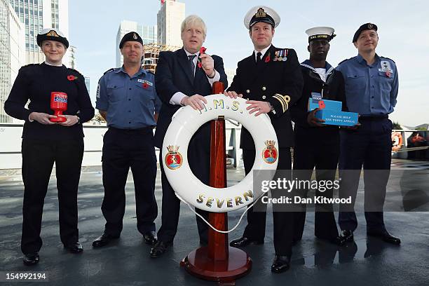 Lt Lauren Calvert, Po Ivor Cross, Mayor of London Boris Johnson, Lt Cdr Marcus Hember, Std Kurt Cudjoe and Cpo Marc Finnigan pose for the press...