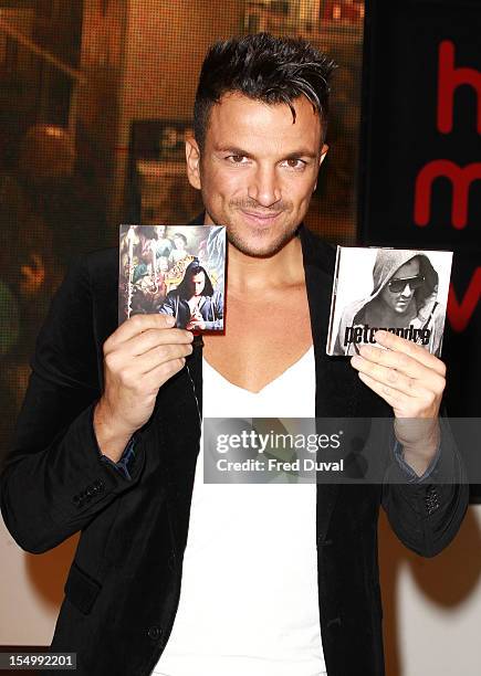 Peter Andre meets fans and signs copies of his album 'Angels & Demons' at HMV, Oxford Street on October 30, 2012 in London, England.