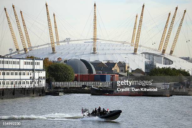 Mayor of London Boris Johnson arrives on board a RIB for a photocall before being winched on board HMS Severn on October 30, 2012 in London, England....