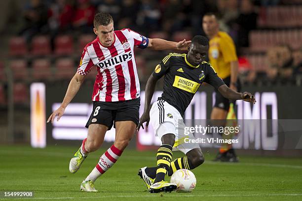 Kevin Strootman of PSV, Atakora Lalawele of AIK Solna during the Europa League match between PSV Eindhoven and AIK Solna at the Philips Stadium on...