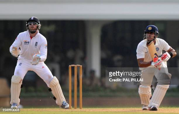 England wicketkeeper Matt Prior looks on as Indian batsman Manoj Tiwary of India 'A' plays a stroke during the first day of a three day practice...