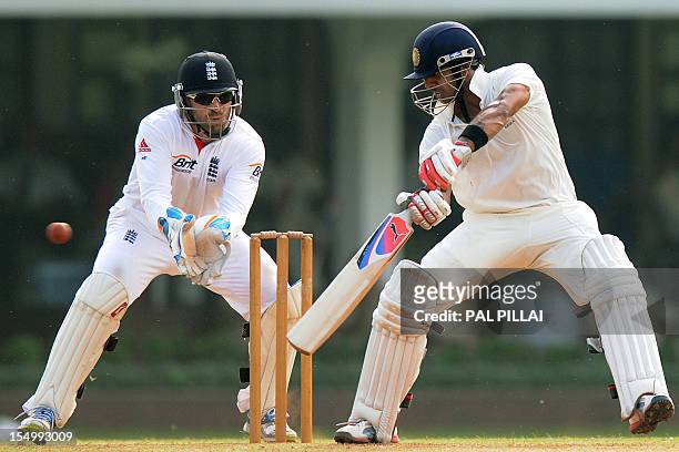 England wicketkeeper Matt Prior looks on as Indian batsman Manoj Tiwary of India 'A' plays a stroke during the first day of a three day practice...