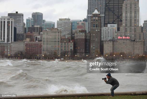 Photographer shoots waves generated from the remnants Hurricane Sandy as they crash into the shoreline of Lake Michigan on October 30, 2012 in...