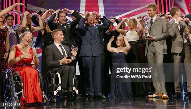 Prince Charles, Prince of Wales, Ellie Simmonds and Bradley Wiggins attend the Pride Of Britain awards at the Grosvenor House Hotel, on October 29,...