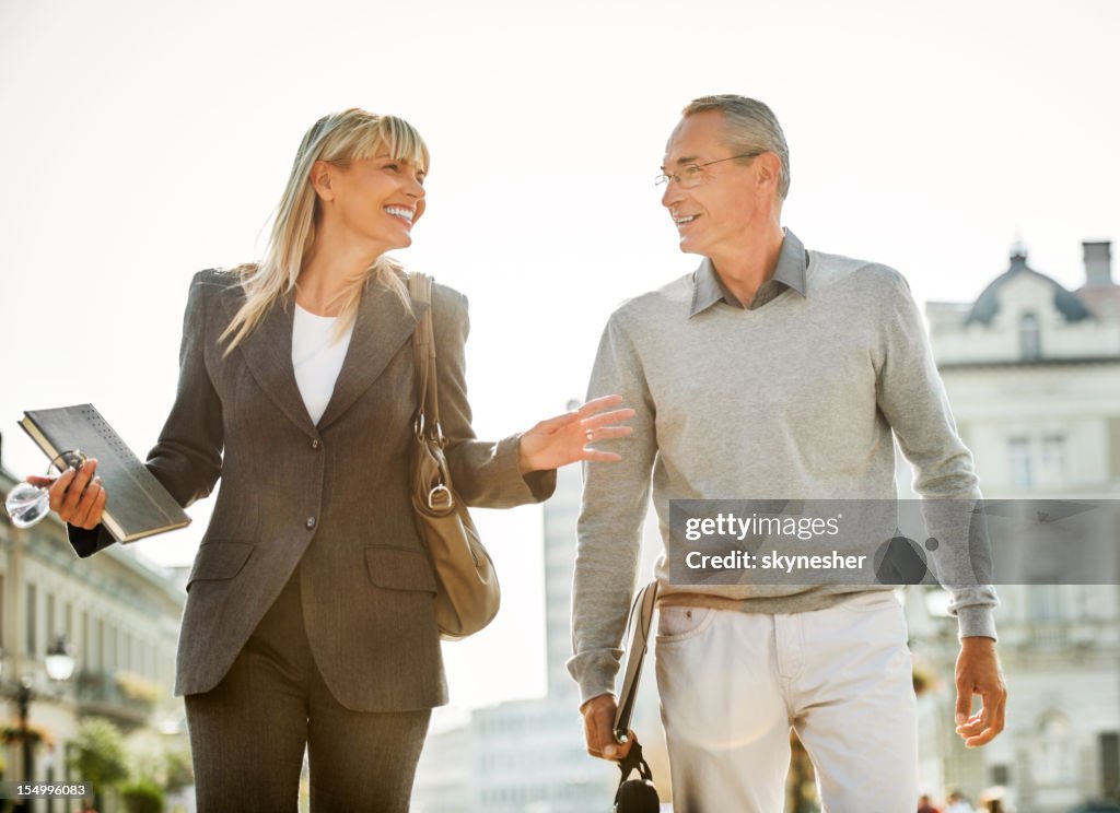 Business people walking in the streets.