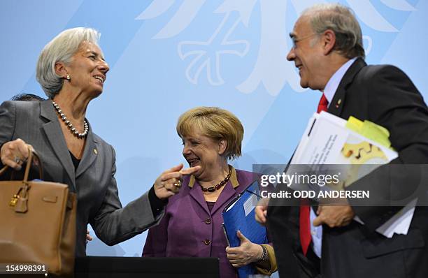 German Chancellor Angela Merkel , Christine Lagarde , managing director of the International Monetary Fund , and the secretary general of the...