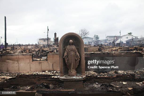 Virgin Mary is all that remains from a home which was destroyed during Hurricane Sandy October 30, 2012 in the Breezy Point neighborhood of the...