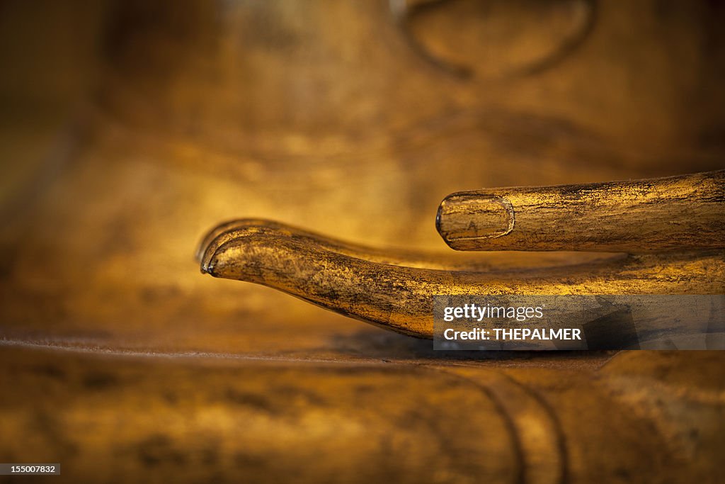 Golden thai buddha hand detail