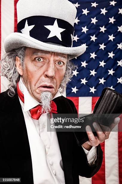 bankrupt uncle sam - uncle sam stock pictures, royalty-free photos & images