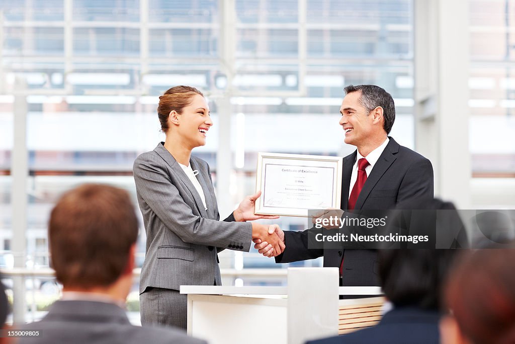 Businesswoman Receiving an Award