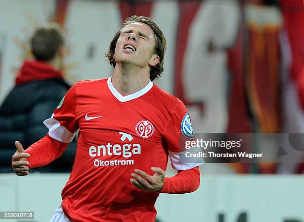 Nicolai Mueller of Mainz gestures after a forgiven chance during the DFB Cup second round match between FSV Mainz 05 and FC Erzgebirge Aue at Coface...