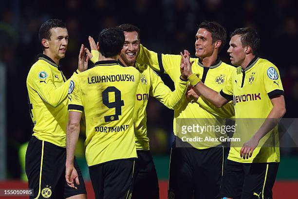 Julian Schieber of Dortmund celebrates his team's fourth goal with team mates Ivan Perisic, Robert Lewandowski, Sebastian Kehl and Kevin Grosskreutz...