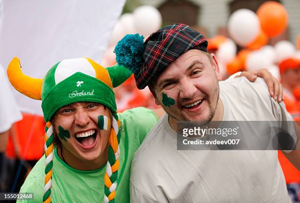 happy man portrait (saint patrick's day) - fans in the front row stock pictures, royalty-free photos & images