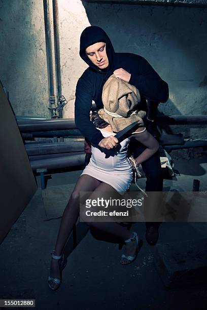 kidnapper threatening his hostage - s & m stock pictures, royalty-free photos & images