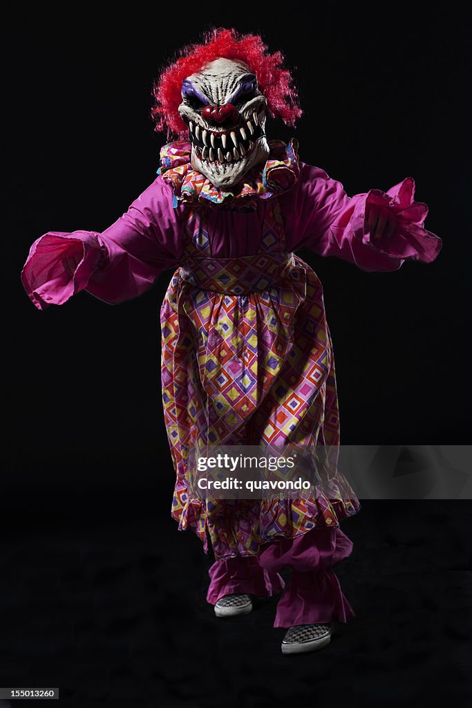 Creepy Halloween Female Clown Costume Portrait on Black