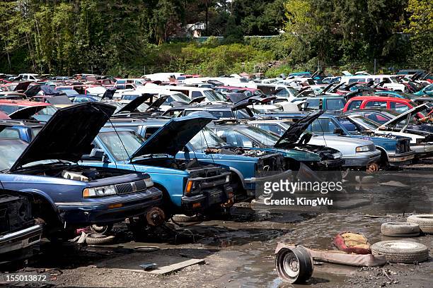 automobile junkyard. - obsolete stock pictures, royalty-free photos & images